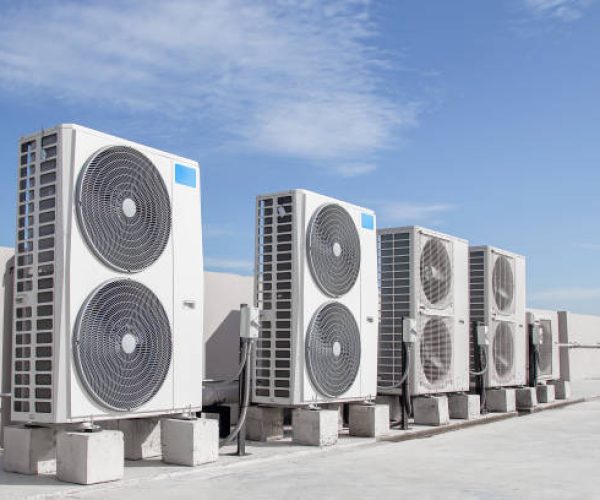 Air conditioning (HVAC) installed on the roof of industrial buildings.
